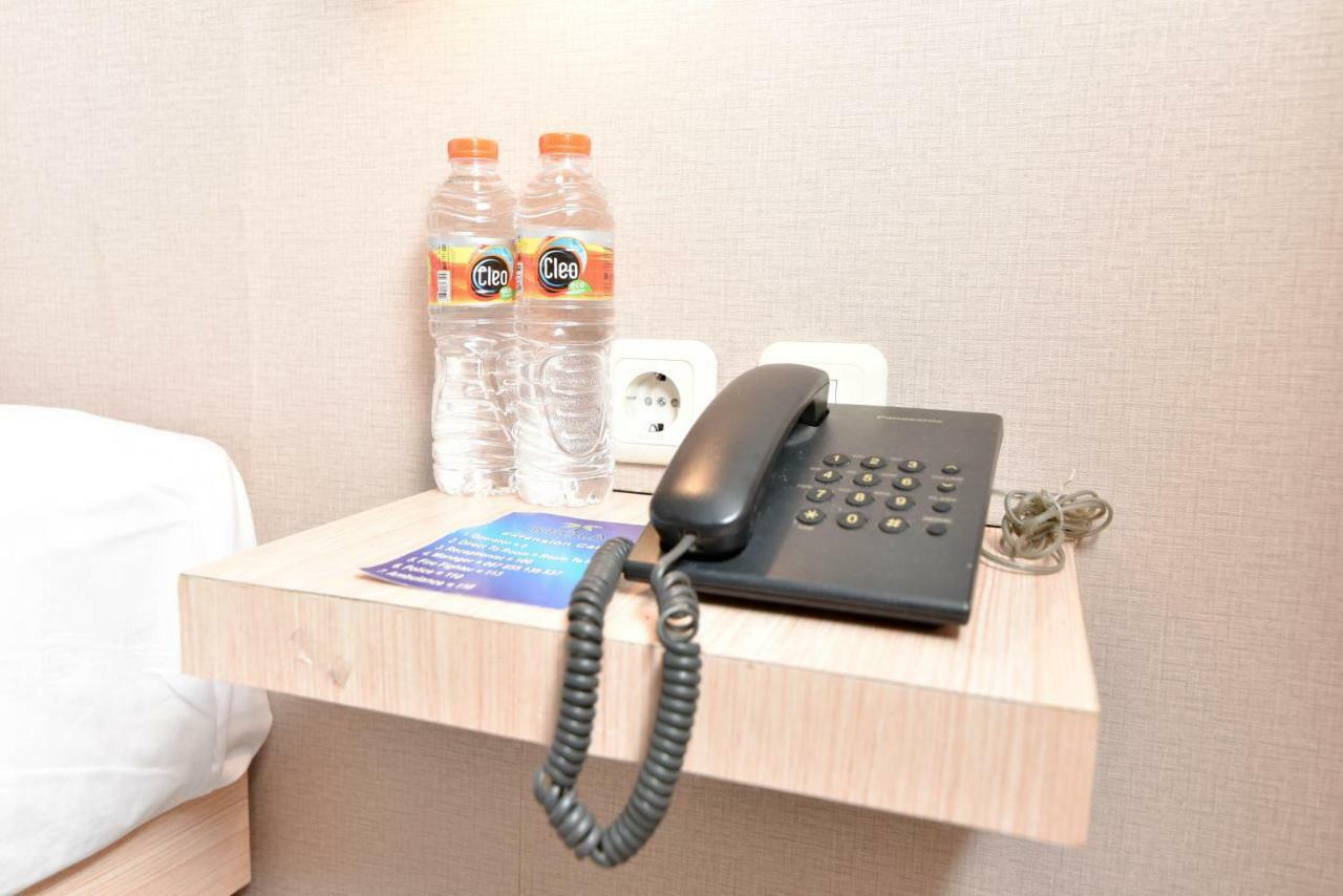 เรดดอร์ซ เนียร์ เลเกียน สตรีท Hotel กูตา ภายนอก รูปภาพ